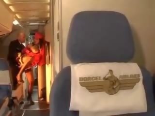 Het till trot stewardessen rider en putz inuti båda hål