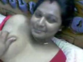 Indian bewitching Desi Aunty In Red Dress