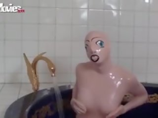 Tanja Takes A Bath In Her Latex X rated movie Doll Costume