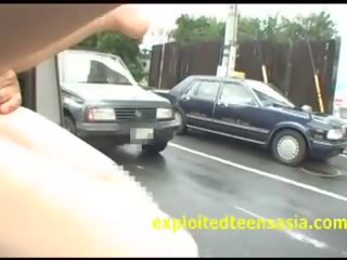 Japanese Public dirty video In Mini Van Traffic For All To See Pussy