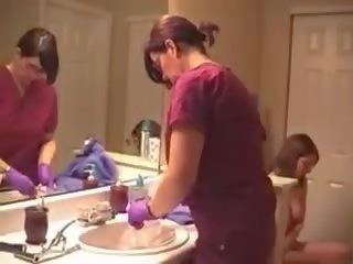 Mother And young female Enema
