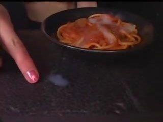 Japanese lady eats spaghetti with cum